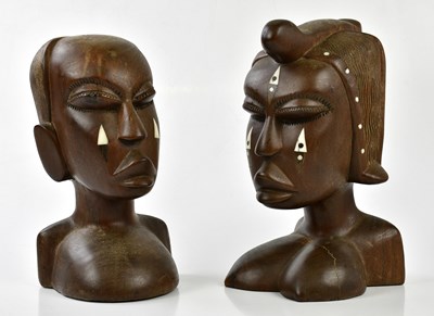 Lot 1226 - A pair of 1950's African wooden busts, largest...