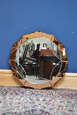 Lot 2601 - A 1930s Art Deco peach mirror, diameter 74cm.