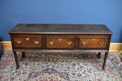 Lot 2401 - An 18th century oak dresser base with three...