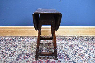 Lot 2404 - A 19th century drop leaf oak side table,...