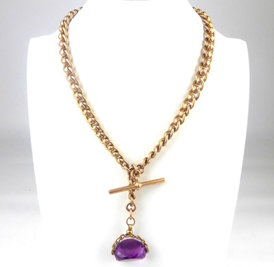 Lot 909 - A 19th century 9ct rose gold watch chain with...