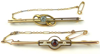 Lot 852 - Two 9ct gold bar brooches, one a bezel set...