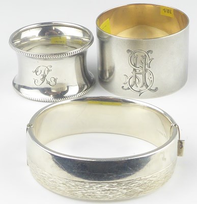 Lot 774 - A hallmarked silver hinged bracelet with half...