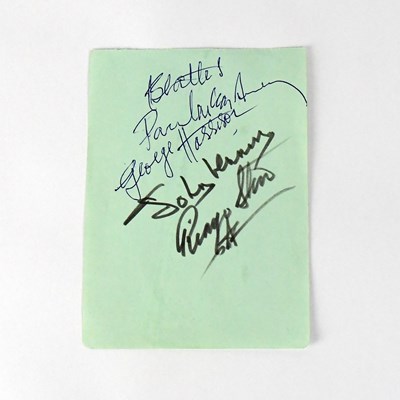 Lot 248 - THE BEATLES; a torn page from an autograph...
