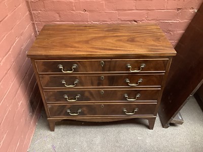 Lot 2512 - A mahogany chest of four drawers on bracket...