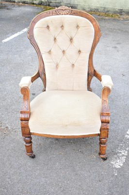 Lot 2573 - A lady's Edwardian wing back chair on spade...