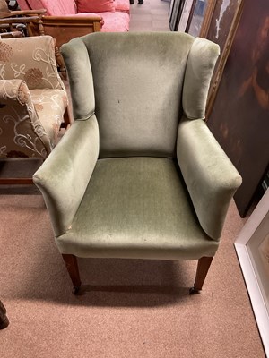 Lot 6681 - A lady's Edwardian wing back chair on spade...