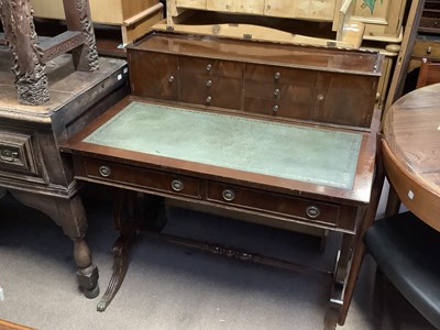 Lot 2642 - A reproduction mahogany writing table with...