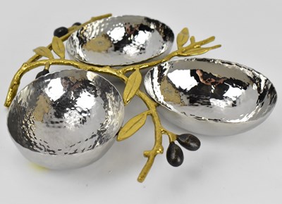 Lot 719 - MICHAEL ARAM; a stainless steel olive branch...