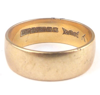 Lot 840 - A 9ct rose gold wedding ring, size K, approx....