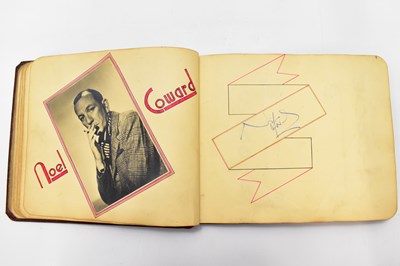 Lot 338 - An autograph album containing approximately...