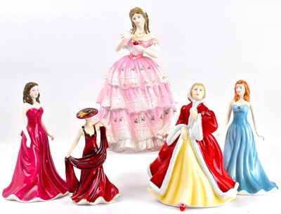 Lot 580 - ROYAL DOULTON; five various porcelain figures,...