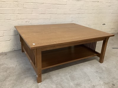 Lot 2615 - An Arts and Crafts style light oak low coffee...