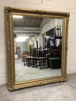 Lot 2422 - A large gilt framed wall mirror, 168 x 140cm.