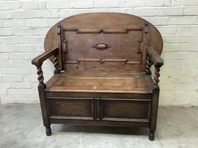 Lot 2640 - A 1920s carved oak monk's bench, height 100cm,...