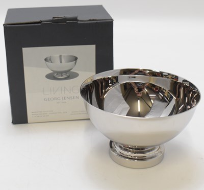 Lot 605 - GEORG JENSEN; a boxed stainless steel...
