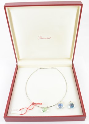 Lot 854 - BACCARAT; a modern silver necklace with three...