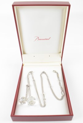 Lot 855 - BACCARAT; a silver choke knot adjustable...