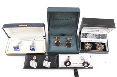 Lot 883 - Five pairs of designer and novelty cufflinks,...
