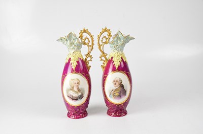 Lot 506 - A pair of Continental gilt-heightened ewers,...