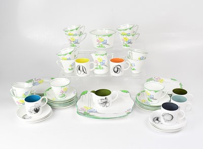 Lot 536 - SUSIE COOPER; a black fruit coffee set...