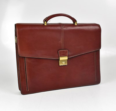 Lot 429 - FRANCINEL; a brown leather satchel with brass...