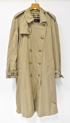 Lot 427 - BURBERRY; a gentlemen's raincoat, together...
