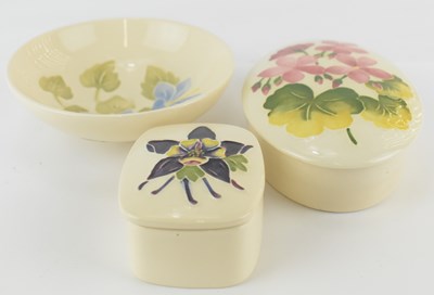 Lot 459 - MOORCROFT; three modern floral decorated...