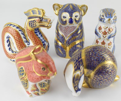 Lot 463 - ROYAL CROWN DERBY; five porcelain paperweights,...