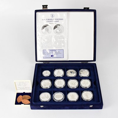 Lot 794 - A partial cased silver collectors' coin set...