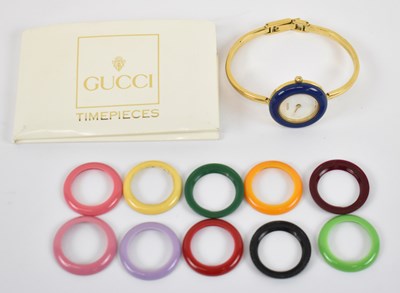 Lot 912 - GUCCI; a lady's yellow stainless steel...