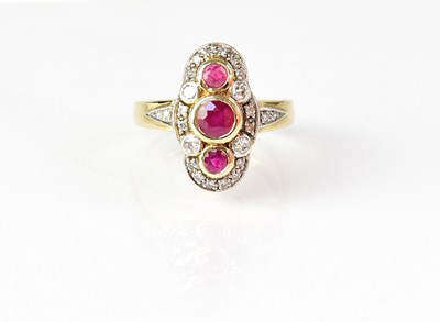 Lot 858 - A 9ct yellow gold navette ring, set with three...