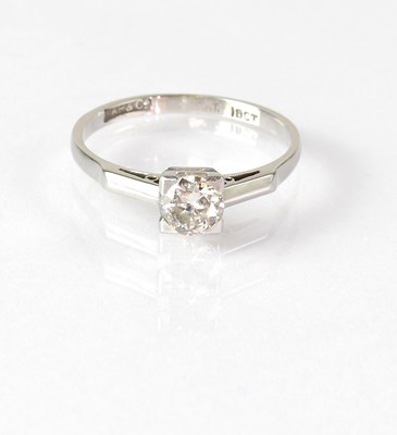 Lot 832 - An 18ct white gold solitaire diamond ring, the...