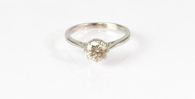 Lot 856 - A 9ct white gold solitaire diamond ring, with...