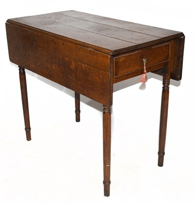 Lot 1489 - An early 19th century oak drop-leaf Pembroke...