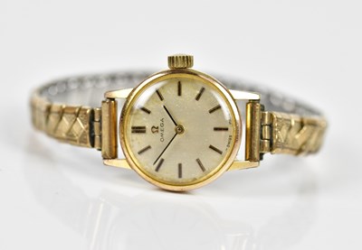 Lot 2949 - OMEGA; a lady's yellow metal cased wrist watch.