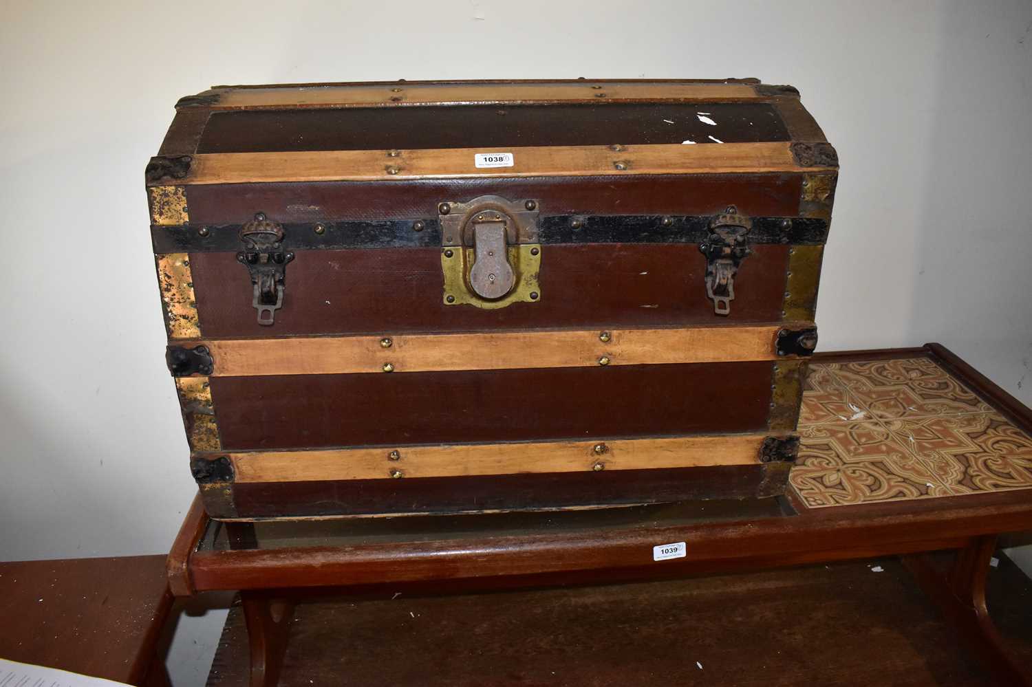 Lot 1038 - Two vintage metal bound dome topped travelling...