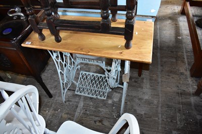 Lot 1051 - A painted Singer treadle sewing machine base...