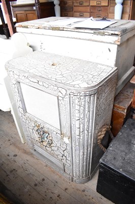 Lot 1072 - A 1950s music cabinet with relief floral...