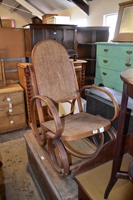 Lot 1079 - AFTER THONET; a bentwood cane back and seated...