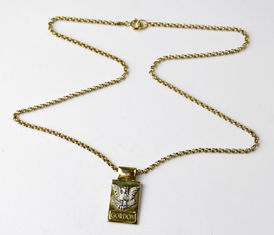 Lot 971 - A 9ct gold pendant of tablet shape