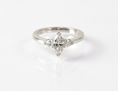 Lot 803 - A platinum ring set with a marquise cut...