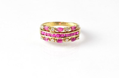 Lot 859 - A 9ct gold ring set with a central band of...