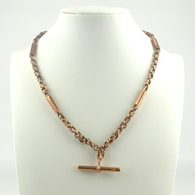 Lot 1052 - A Victorian 9ct rose gold watch chain, with...