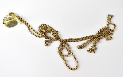 Lot 956 - A 9ct gold mounted swivel seal pendant on a 9ct gold belcher link muff chain