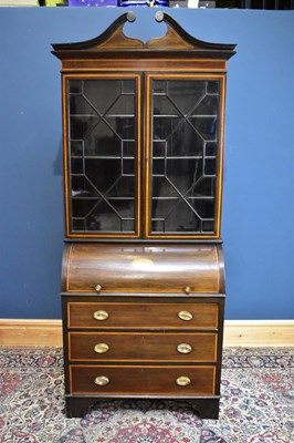 Lot 2437 - An Edwardian inlaid mahogany bureau bookcase...