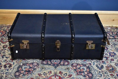 Lot 1493 - A navy blue travel trunk, width 90cm.