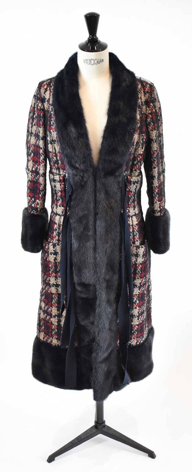 Lot 14 - LOUIS VUITTON; a navy blue, red and cream...
