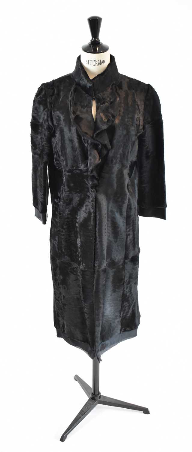 Lot 20 - OSCAR DE LA RENTA; a black short fur full...