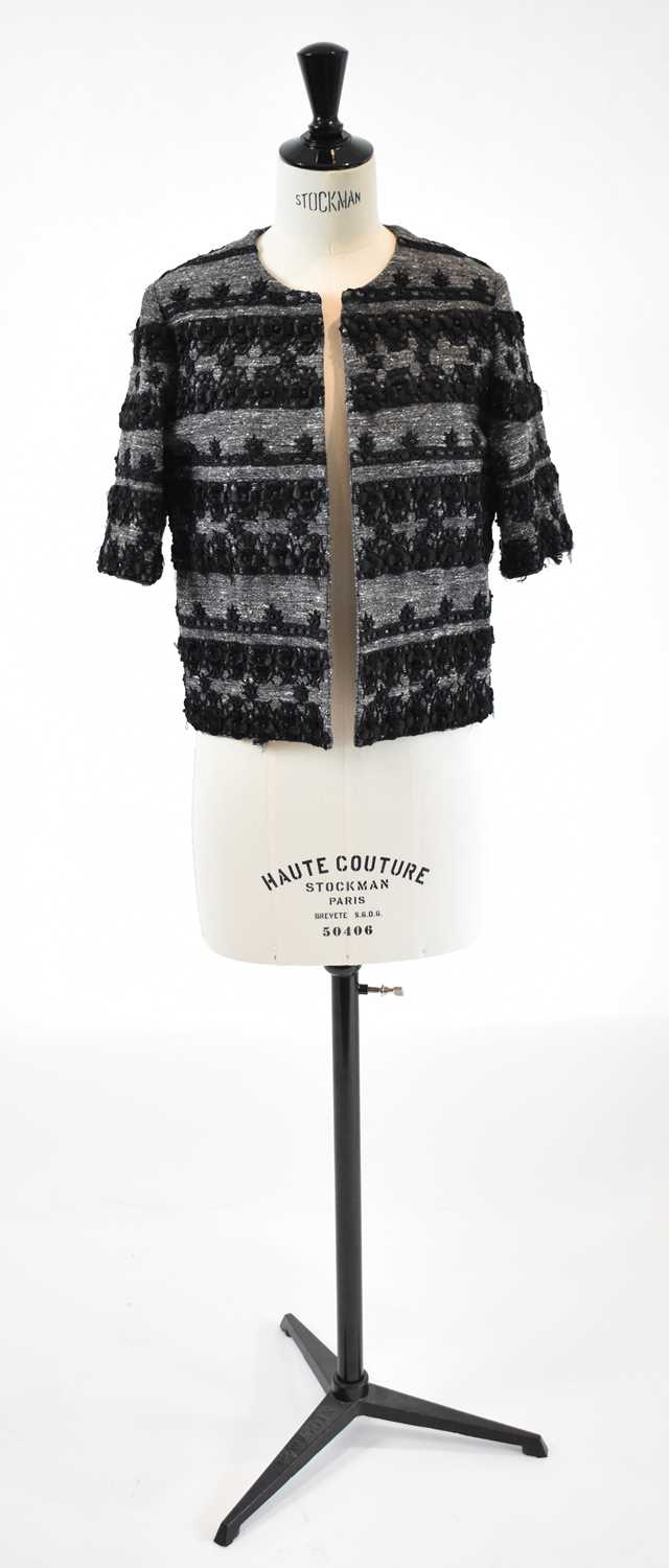 Lot 21 - CHLOE; a grey short sleeved cropped jacket...